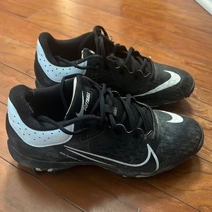 Black with white Nike women’s softball cleats size 7. Worn one season.
